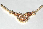 Code KJDP TN-120Gold 18 ktWeight 4.390 gmsDipc. 36Diamond 0.65 ctRs 14,100/-, click here to see large picture.