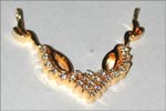 Code KJDP TN-103Gold 18 ktWeight 3.240 gmsDipc. 23Diamond 0.34 ctRs 8,200/-, click here to see large picture.