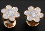 Code KJDT TP 127Gold 18 ktWeight 5.340 gmsDipc. 50Diamond 0.62 ctRs 15,871/-, click here to see large picture.