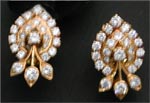 Code KJDT TP 132Gold 18 ktWeight 4.958 gmsDipc. 48Diamond 0.93 ctRs 24,611/-, click here to see large picture.