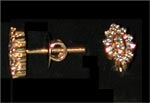 Code KJDT TP 104Gold 18 ktWeight 3.762 gmsDipc. 24Diamond 0.470 ctRs 11,841/-, click here to see large picture.