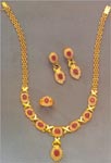 Code KJGJC 2917Gold 22 ktWeight 60 gmsCubic Zircons 5 ctRuby 13 ct, click here to see large picture.